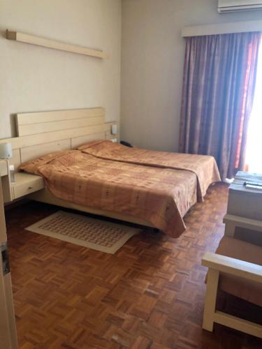 Cama o camas de una habitación en Hotel Kypreos