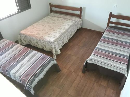 Postel nebo postele na pokoji v ubytování Sítio Luar