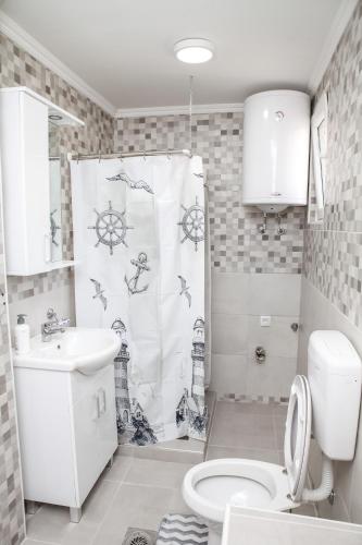 Koupelna v ubytování Apartman Kaća