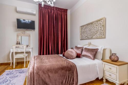 Posteľ alebo postele v izbe v ubytovaní Acropolis deluxe Apt.(Must)