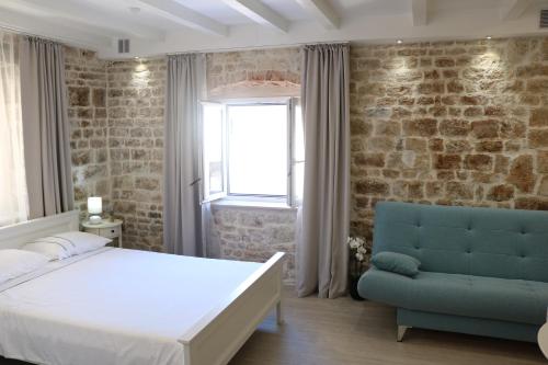 Postel nebo postele na pokoji v ubytování Trogir Square Apartment