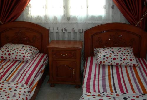 Letto o letti in una camera di La Colline de Chott Meriem appartements