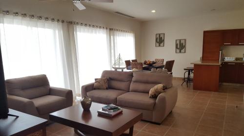a living room with a couch and a table at Casa Tu Paz in La Paz