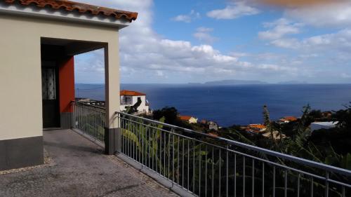 a view of the ocean from the balcony of a house at Vista Atlântico in Gaula