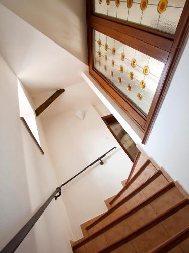 a staircase in a house with a skylight at Staroměstský Penzion in Tábor