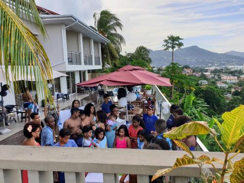 a group of people standing outside of a building at The Ridge Residence in Victoria