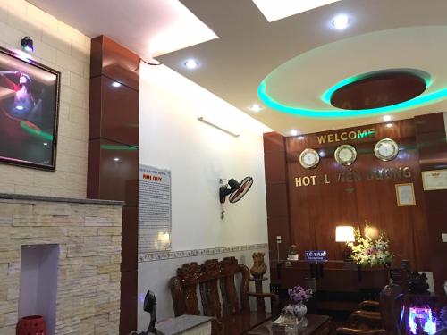 a waiting room at a hotel with a welcome sign at Vien Duong Hotel in Quy Nhon