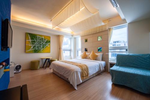 Postel nebo postele na pokoji v ubytování Indigo Homestay