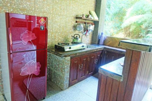 Η κουζίνα ή μικρή κουζίνα στο Rumah Kelinci