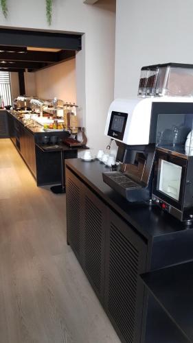 an office with a desk with a computer on it at Abacus Suites in Ayia Napa