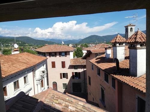 a view of a city from the roofs of buildings at Casa In Piazza in Cividale del Friuli