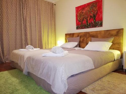 Un pat sau paturi într-o cameră la Imaculado Village