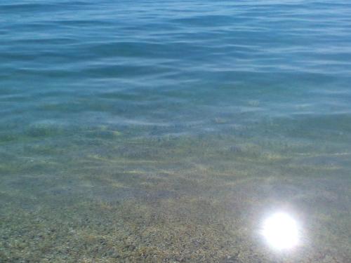 a view of the water with a light in it at Central Fountain in Asprovalta