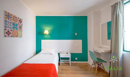 Posteľ alebo postele v izbe v ubytovaní Hotel Italia