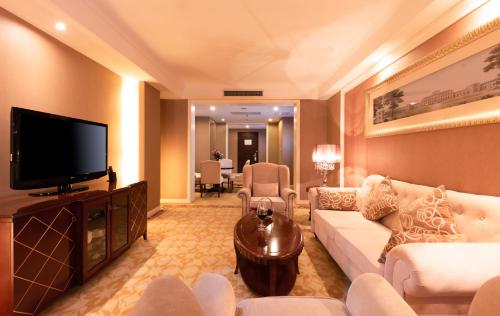 Μια τηλεόραση ή/και κέντρο ψυχαγωγίας στο Country Garden Phoenix Hotels Shenyang Yuhong