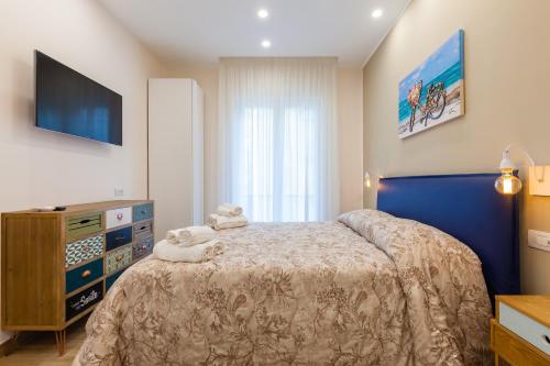 Posteľ alebo postele v izbe v ubytovaní Sorrento Sweet Sirena 1
