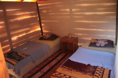Кровать или кровати в номере Sultan Camp
