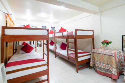 Postel nebo postele na pokoji v ubytování Conrado's Apartelle