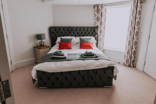 Ένα ή περισσότερα κρεβάτια σε δωμάτιο στο Cavendish House with Secure, Allocated Parking, 2 mins walk from Windsor Castle