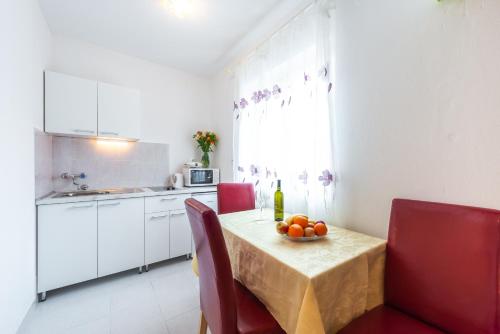 Η κουζίνα ή μικρή κουζίνα στο Apartment Fiorenini