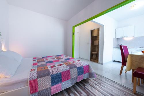 Ένα ή περισσότερα κρεβάτια σε δωμάτιο στο Apartment Fiorenini