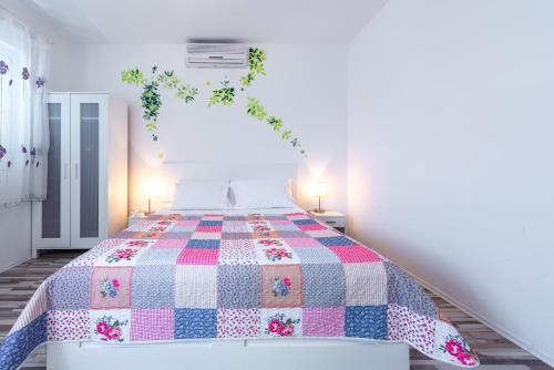 Ένα ή περισσότερα κρεβάτια σε δωμάτιο στο Apartment Fiorenini