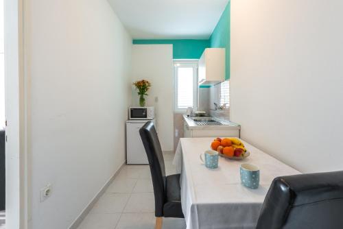Η κουζίνα ή μικρή κουζίνα στο Apartment Fiorenini