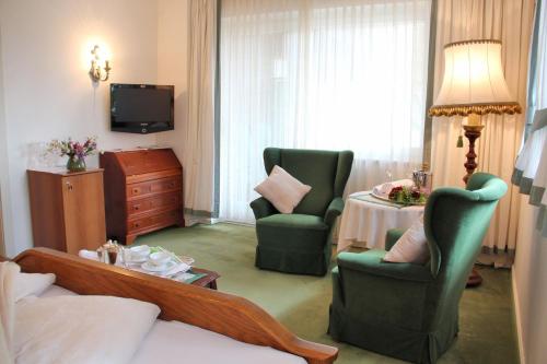 Dietrichsteinerhof Apartments & Roomsにあるテレビまたはエンターテインメントセンター