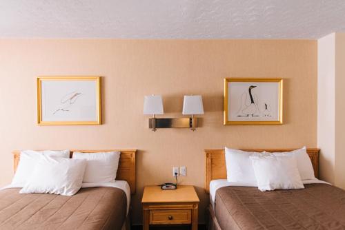 Säng eller sängar i ett rum på Motel Mistral