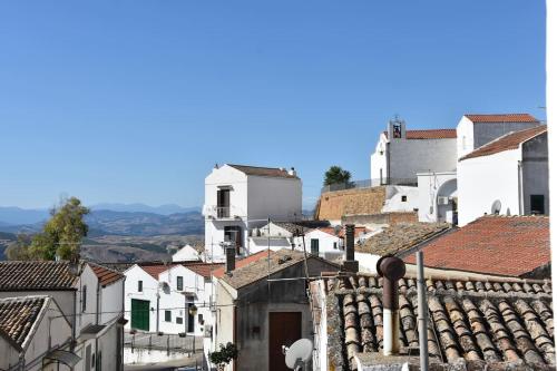 a view of a town with white buildings at ADRIANA in Pisticci