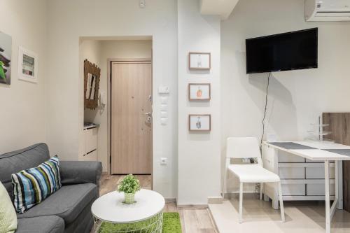 TV a/nebo společenská místnost v ubytování Cozy Apartment in City Center