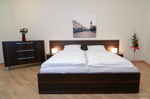 Posteľ alebo postele v izbe v ubytovaní Hotel Bélier