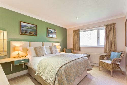 Ένα ή περισσότερα κρεβάτια σε δωμάτιο στο The Glen Guest House