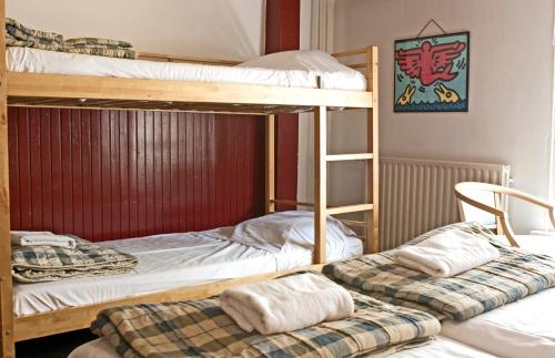 Katil atau katil-katil dalam bilik di De Mallemoolen