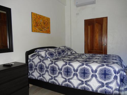 Postel nebo postele na pokoji v ubytování Conde Santome Colonial