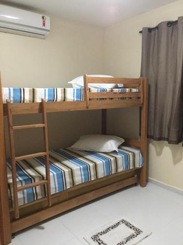 Tempat tidur susun dalam kamar di Apto Porto de Galinhas