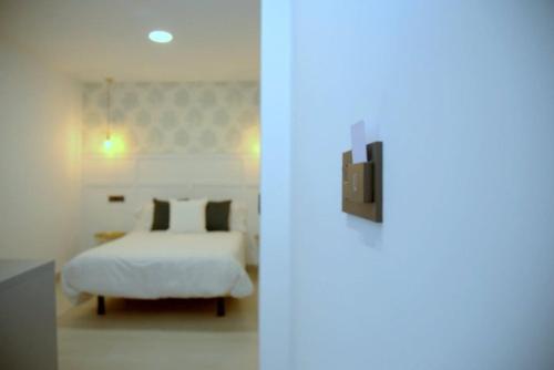Cama o camas de una habitación en Hotel Cedran