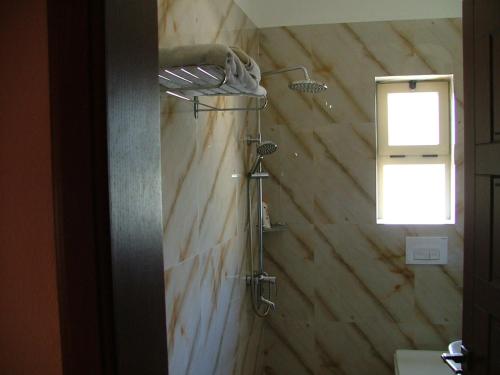 Ein Badezimmer in der Unterkunft Hotel Dollari
