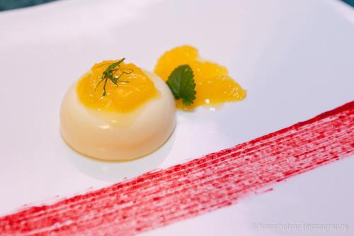 a deviled egg on a white plate with fruit at Gasthof Hensle in Sankt Gallen