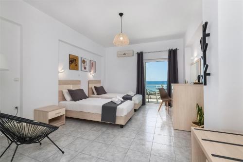 Ένα ή περισσότερα κρεβάτια σε δωμάτιο στο V&C Paradise Apartments