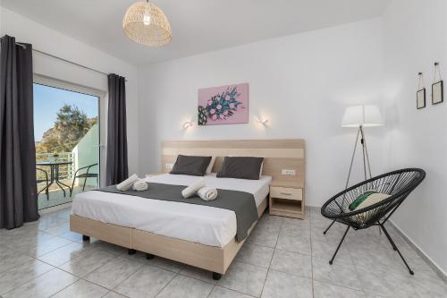 Ένα ή περισσότερα κρεβάτια σε δωμάτιο στο V&C Paradise Apartments