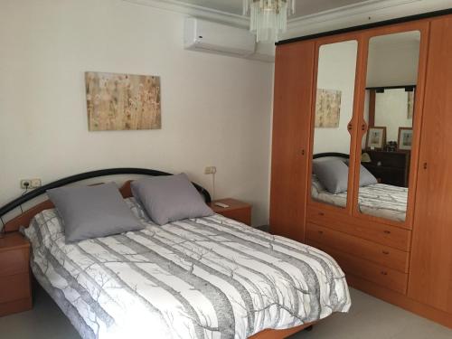 Postel nebo postele na pokoji v ubytování 1 Calle del Mar Apartamento