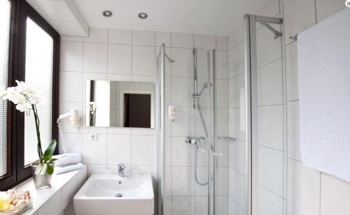 Et badeværelse på Hotel Seeluna am Klostersee