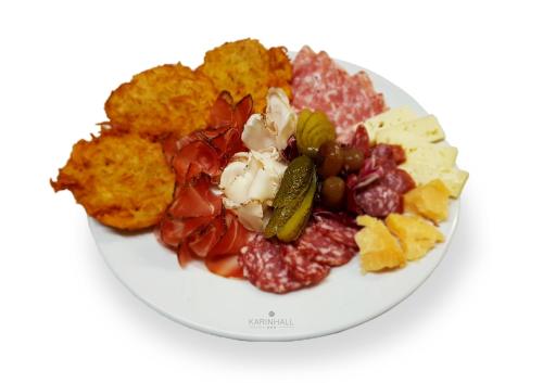 a plate of food with different types of foods at Hotel Karinhall in Trento