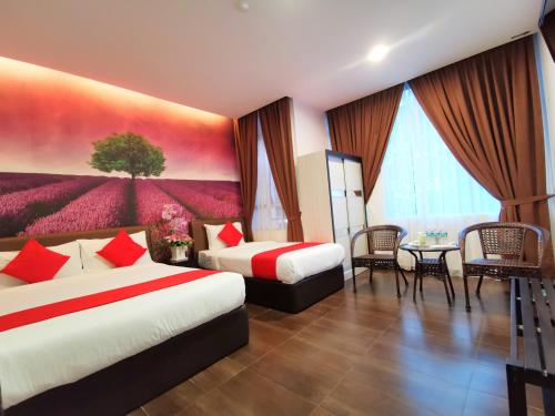 Postel nebo postele na pokoji v ubytování Palazzo Hotel Kulai