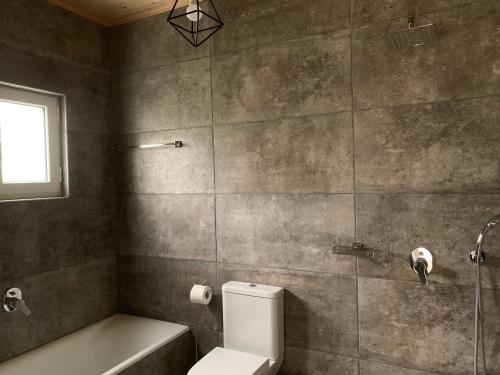 A bathroom at Anastasios Olive Garden Apartments