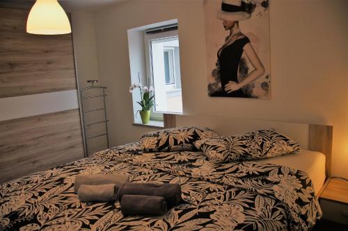 Säng eller sängar i ett rum på Apartmaji Hrvatin v Kortah