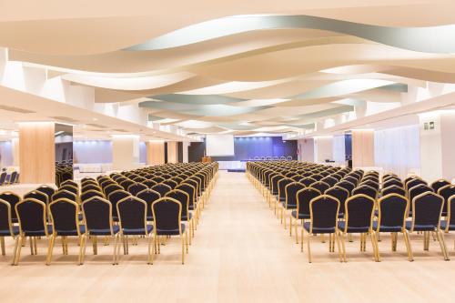 an image of a conference room with chairs at Hotel Olympia Valencia in Alboraya