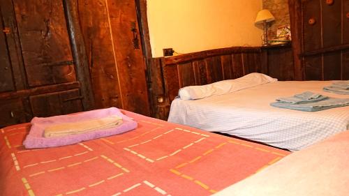 Ένα ή περισσότερα κρεβάτια σε δωμάτιο στο Casa O´Crego