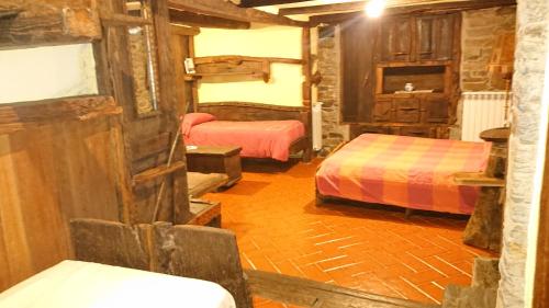 Ένα ή περισσότερα κρεβάτια σε δωμάτιο στο Casa O´Crego